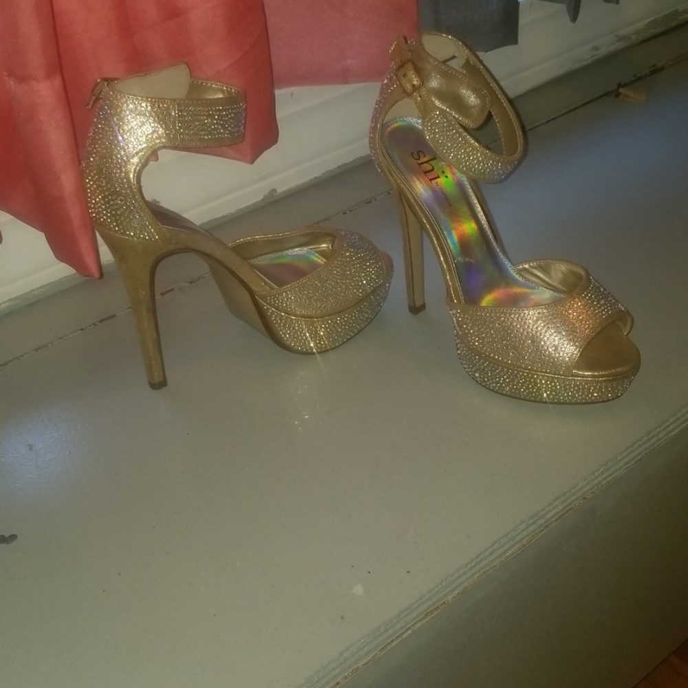 Gold stilettos with rhinestones